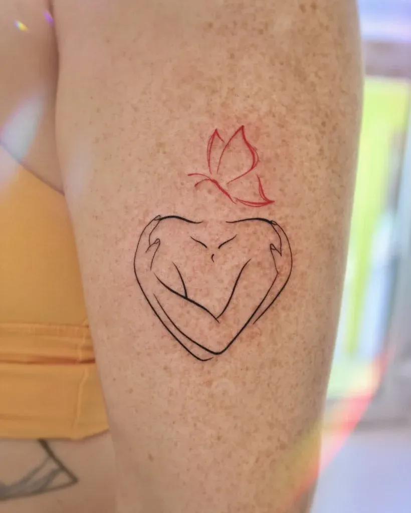 **Embracing Heart Tattoo**