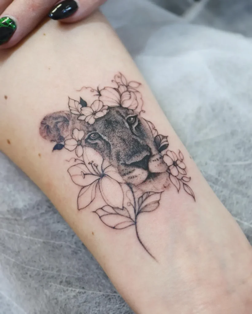 **Lioness in Bloom Tattoo**