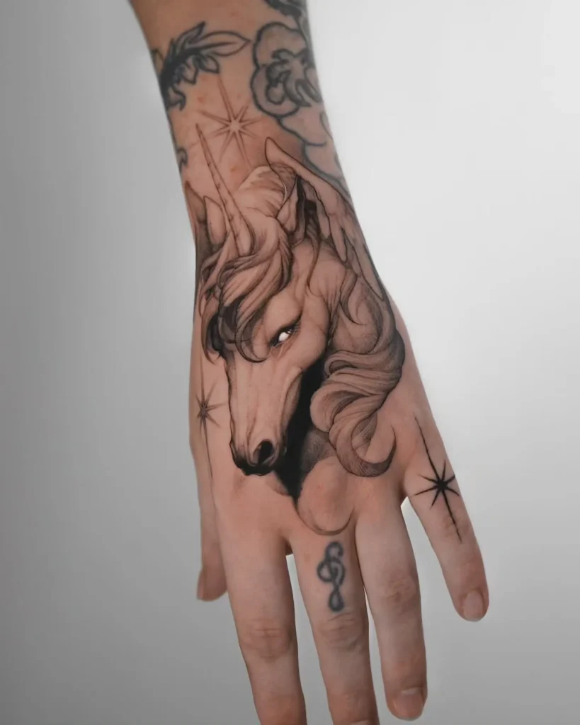 ### Mystical Hand Unicorn Tattoo