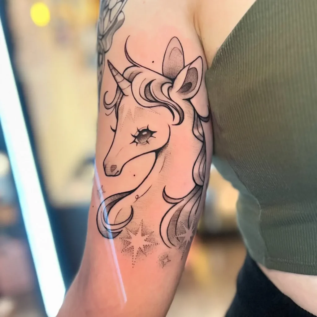 **Starry-Eyed Unicorn Tattoo**