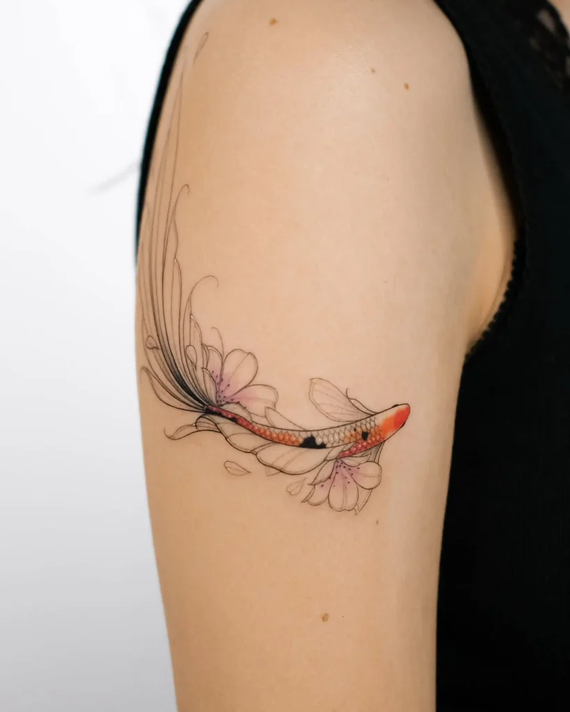 **Delicate Floral Fish Tattoo**