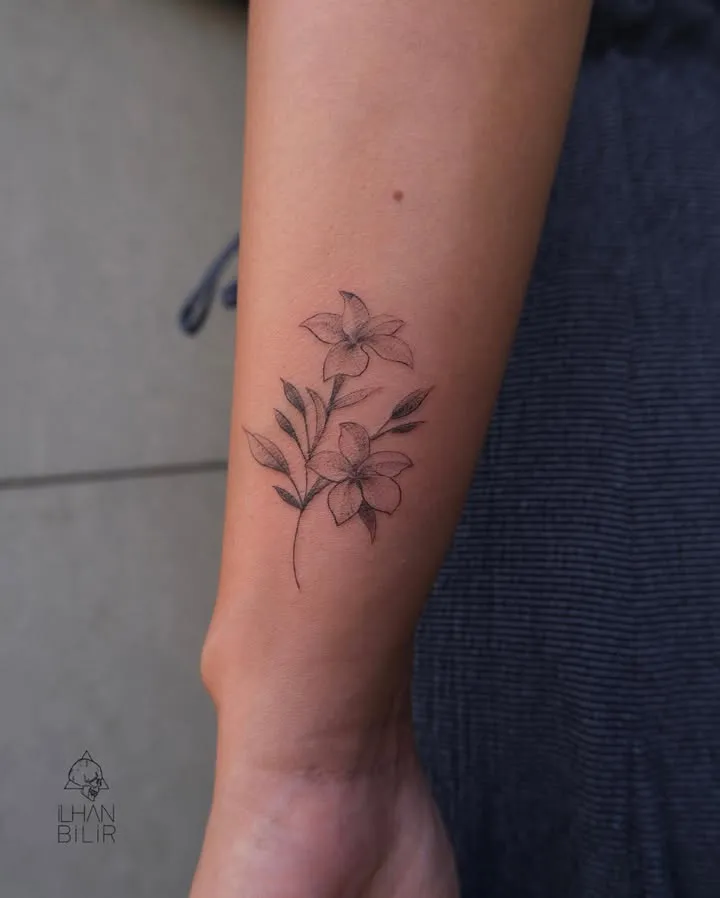 ### Delicate Floral Whispers Tattoo