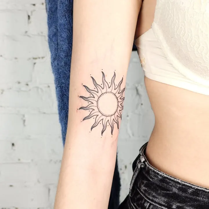 **Delicate Radiant Rays Tattoo**