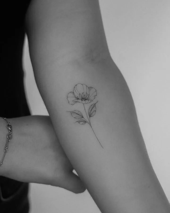 **Elegant Bloom Simplicity Tattoo**