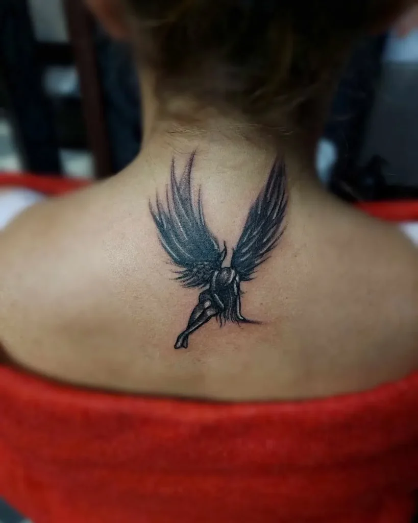 ### Embracing Angel Wings Tattoo