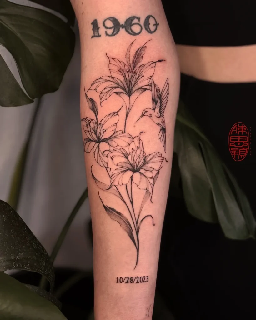 ### Hummingbird and Lilies Tattoo