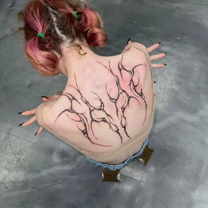 **Interwoven Branches Tattoo**