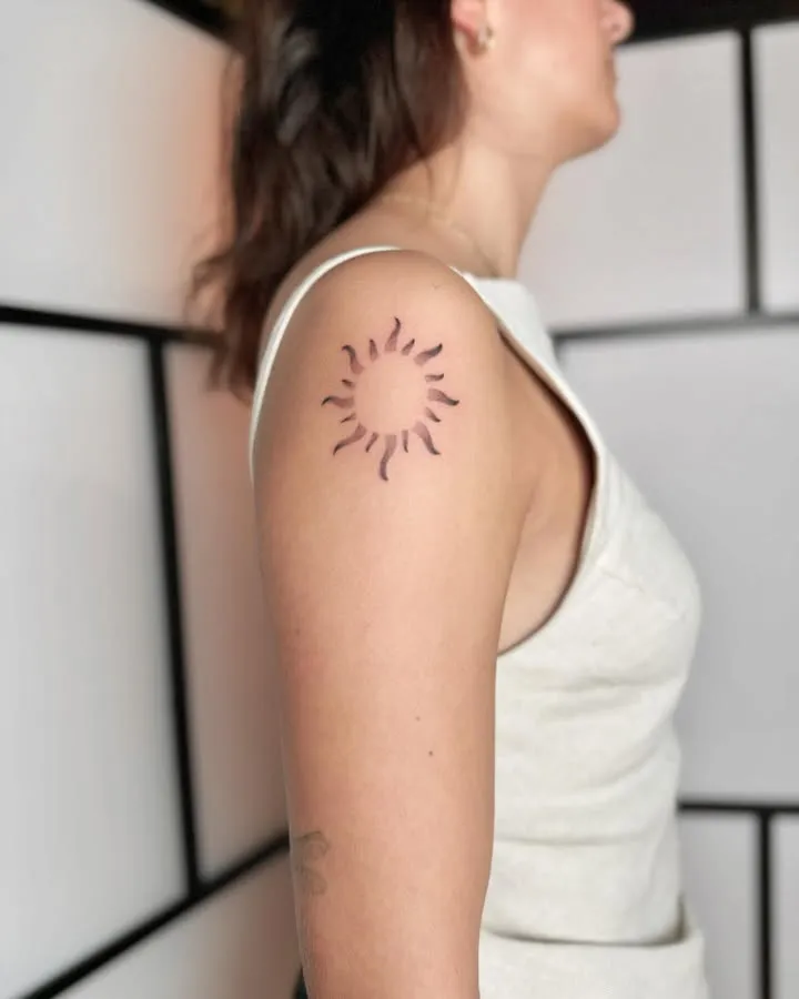 **Minimalist Sun Embrace Tattoo**