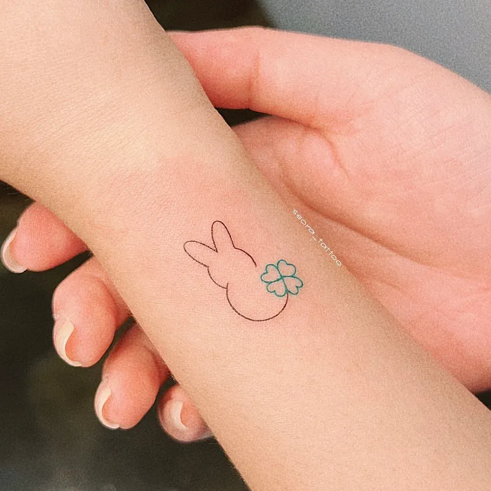 ### Minimalistic Clover Bunny Tattoo