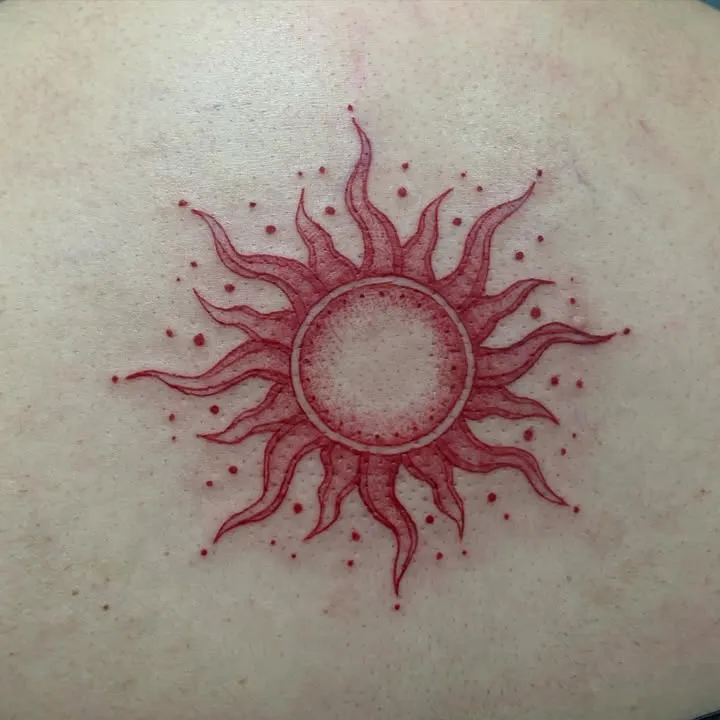 **Swirling Sunburst Tattoo**