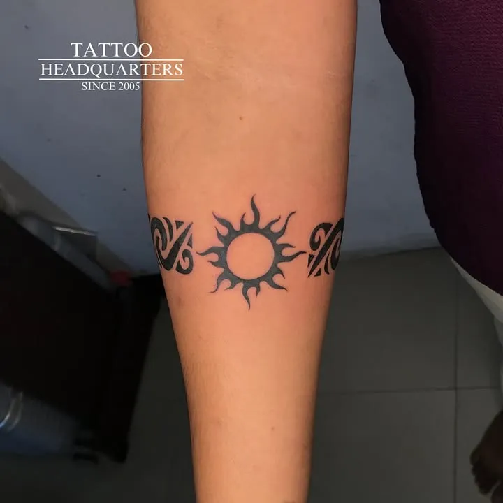 **Tribal Sunburst Tattoo**