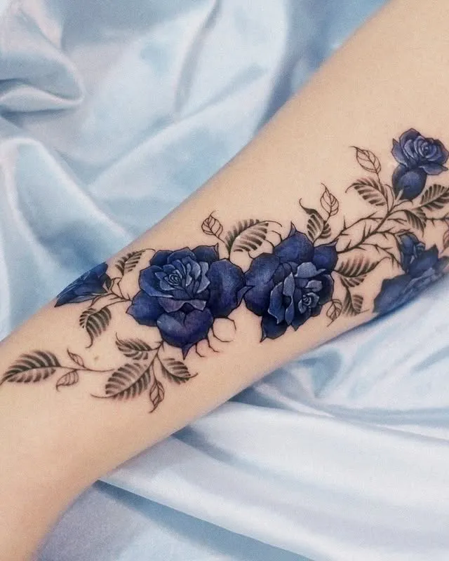 **Blue Rose Elegance Tattoo**