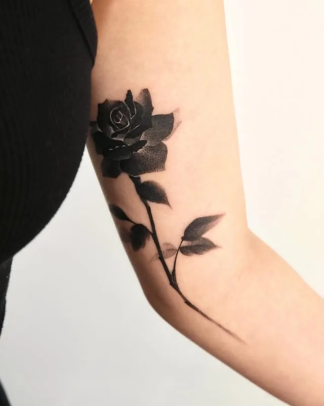 ### Bold Black Rose Tattoo