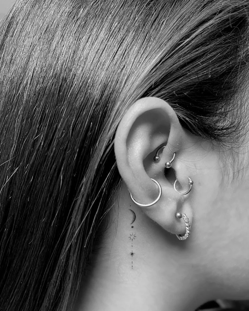 ### Celestial Ear Magic Tattoo