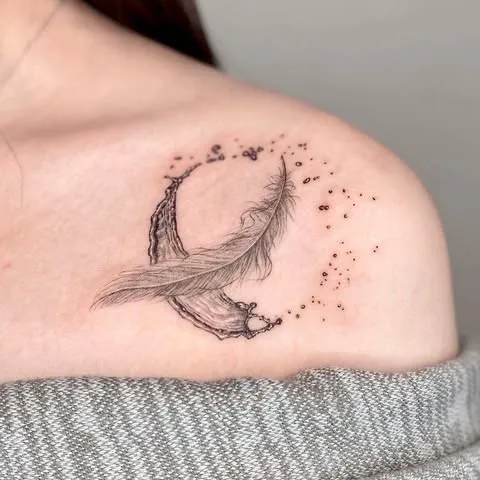 **Celestial Feather Elegance Tattoo**