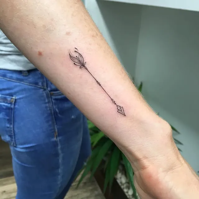 Delicate Arm Arrow Tattoo