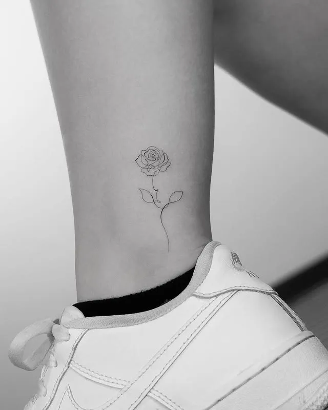 ### Delicate Stem Simplicity Tattoo