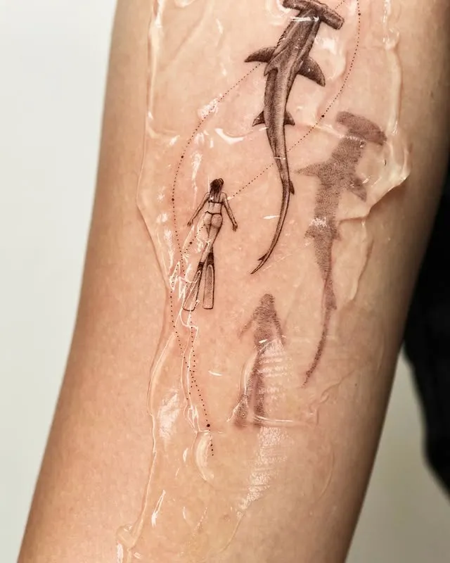 Diver with Sharks Tattoo