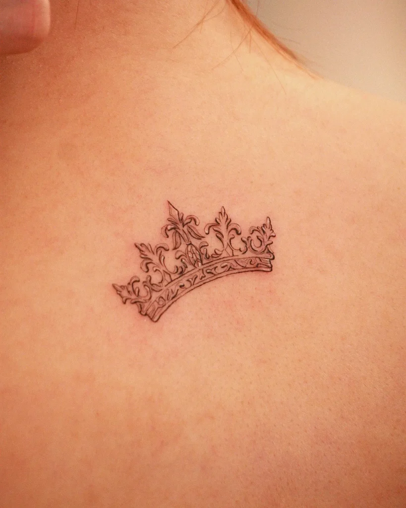 **Elegant Ornate Crown Tattoo**