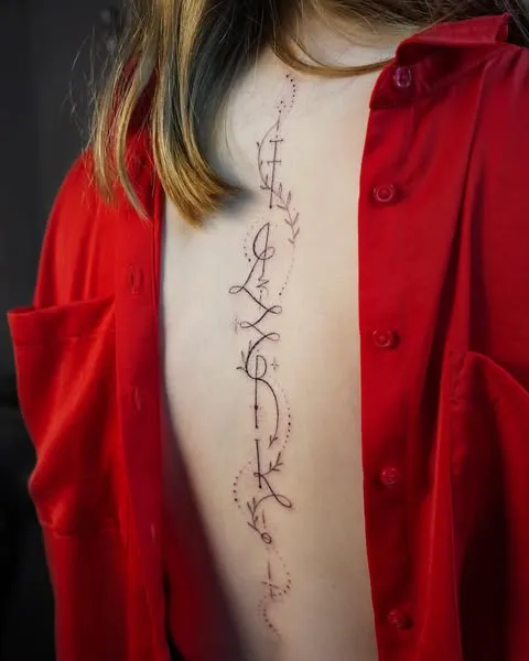 Enchanting Back Script Tattoo