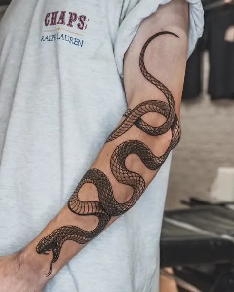 **Flowing Arm Charm Tattoo**