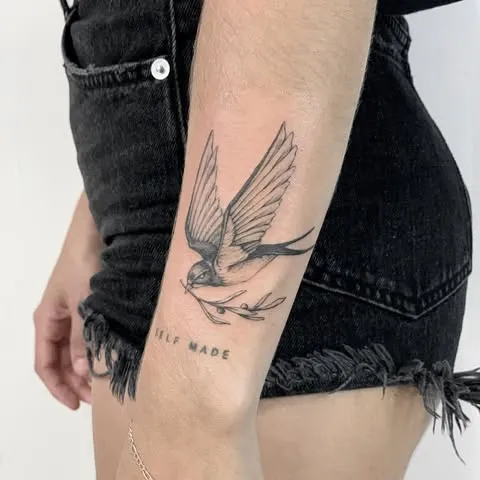 Flying Swallow with Olive Branch Tattoo