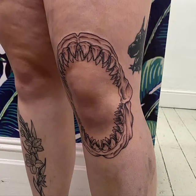 Knee-Jaw Illusion Tattoo