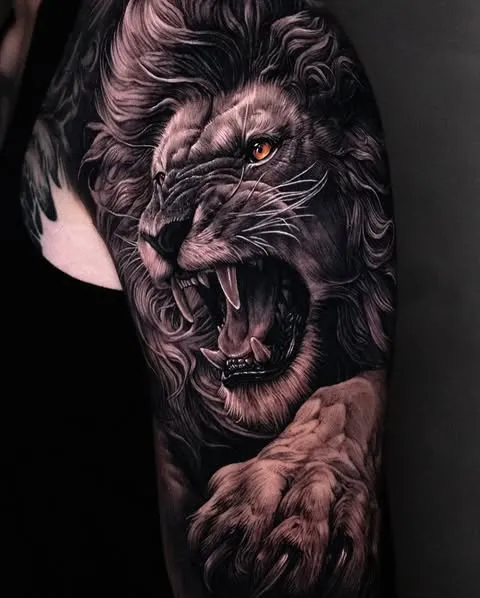 Lion in Motion Tattoo