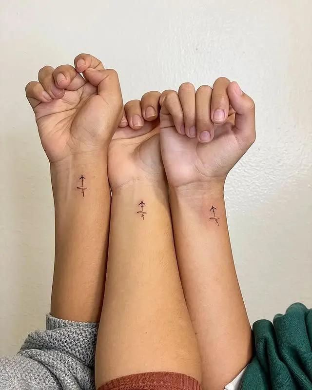 Matching Sailboat Tattoos