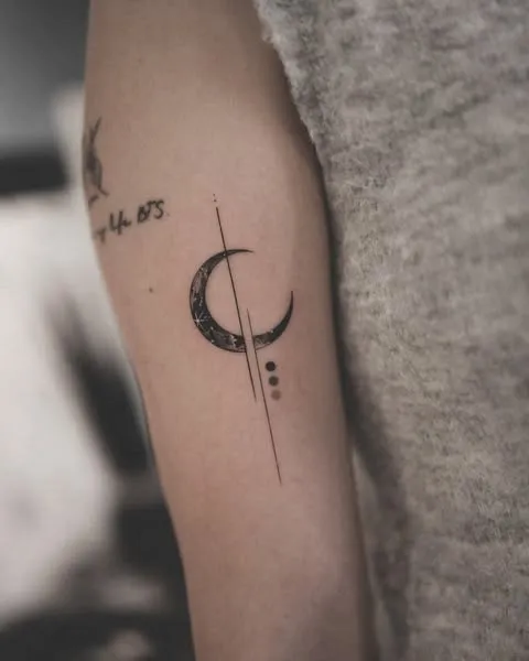 ### Minimalist Crescent Moon Tattoo