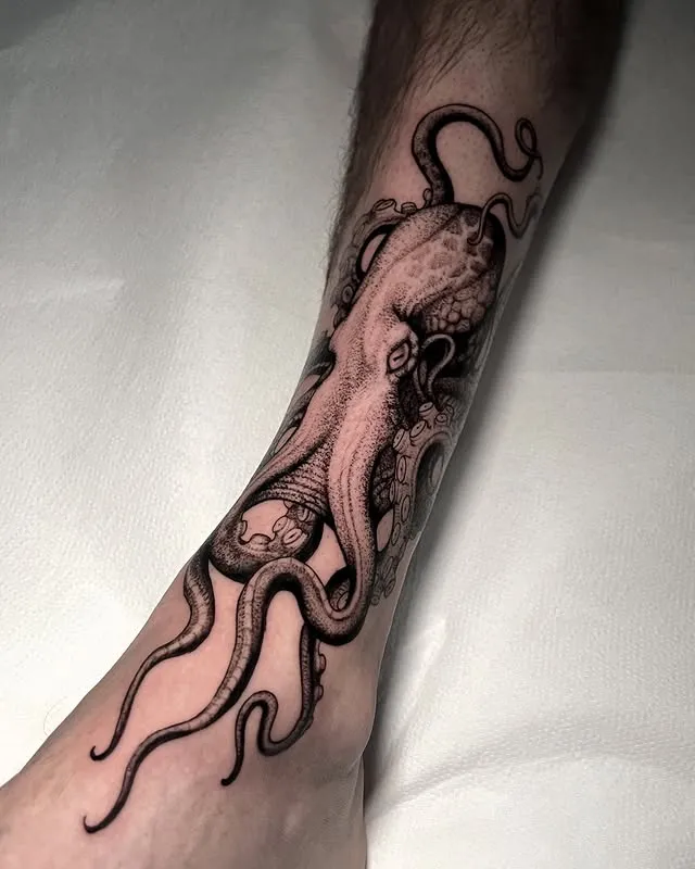 Octopus Embracing Ankle Tattoo