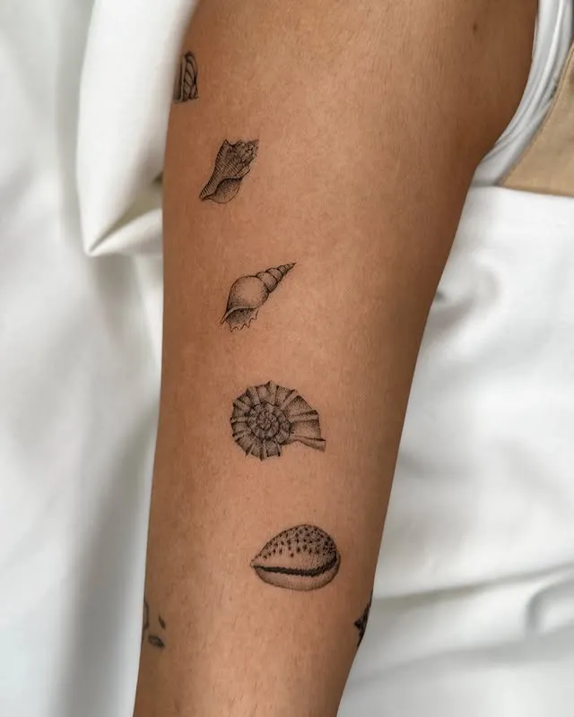 21 Shell Tattoos: Coastal Symbolism, Art & Oceanic Whispers